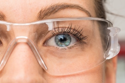 woman wearing safety glasses