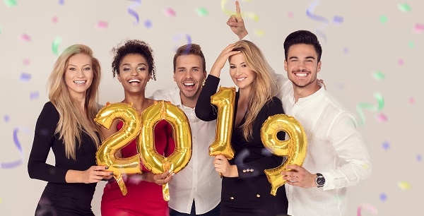 Group of young people celebrating 2019 New Year