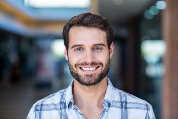 Man smiling after LASIK surgery in Mobile AL